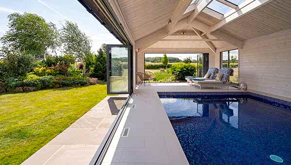 pool house with bifold door opened